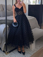 Robe mi-longue raffinée à pois trapèze