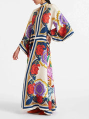 Robe longue raffinée drapée manches cascade