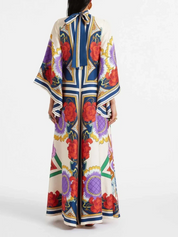 Robe longue raffinée drapée manches cascade