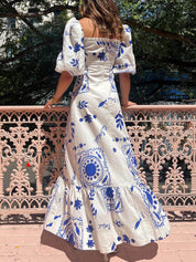 Robe mi-longue manches bouffantes de vacances