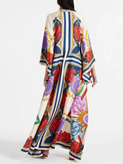 Robe longue raffinée drapée manches cascade