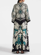 Robe longue Elegance manches cascade à imprimé floral