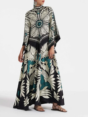 Robe longue Elegance manches cascade à imprimé floral