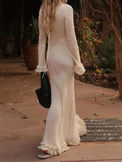 Robe longue élégante en maille manches trompette