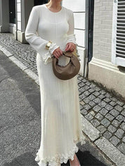 Robe longue élégante en maille manches trompette